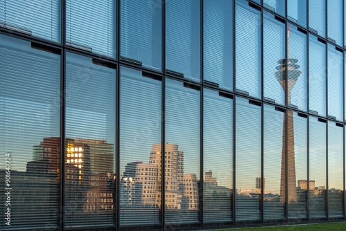 Reflection of skyscrapers and the Rhine Tower in the city of Dusseldorf