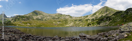 Panoramic view of Bucura lake in National Park Retezat, Romania. This is the glacial lake with the largest surface in Romania. photo