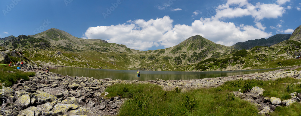 Panoramic view of Bucura lake in National Park Retezat, Romania. This is the glacial lake with the largest surface in Romania. Panoramic view of Bucura lake in National Park Retezat, Romania. This is the glacial lake with the largest surface in Romania.