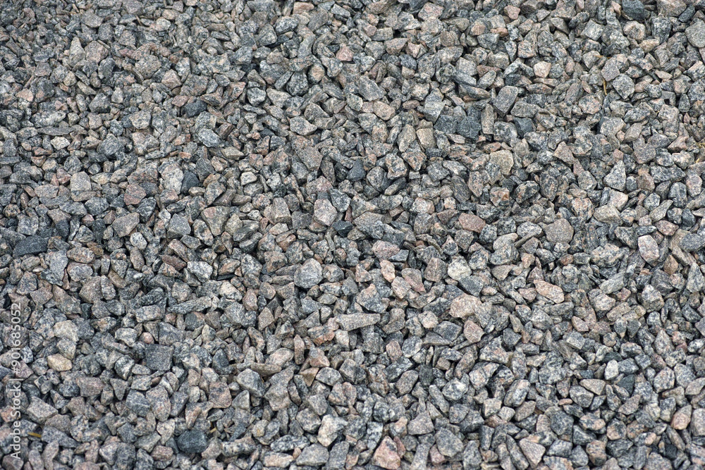 A background of crushed granite. Close up. A background of crushed granite. Close up.