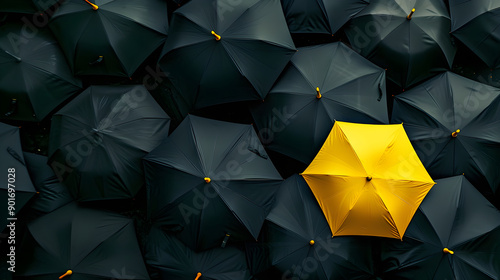 Banner with a yellow umbrella on a background of black umbrellas. Concept template of exclusivity, safety and leadership with space for text