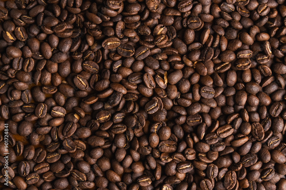 Obraz premium background of roasted coffee bean, arabica wash process, medium roasted