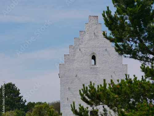 Close up of a Den Tilsandede Kirke in Skagen, Denmark. A famous ancient buried in dune church, earlier partially covered with sand photo