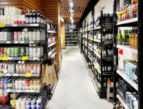 Wallpaper Mural Choosing a dairy products at supermarket.Grocery stores .blurred background Torontodigital.ca