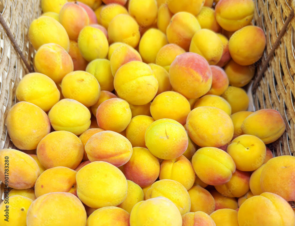 buying apricots, peaches,various fruits on supermarket shelves buying apricots, peaches,various fruits on supermarket shelves