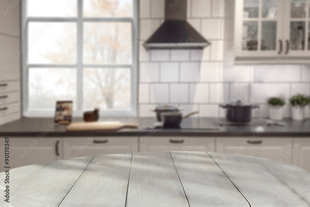 Empty table with copy space for products and blurred kitchen with nostalgic natural daily light background. Empty table with copy space for products and blurred kitchen with nostalgic natural daily light background.