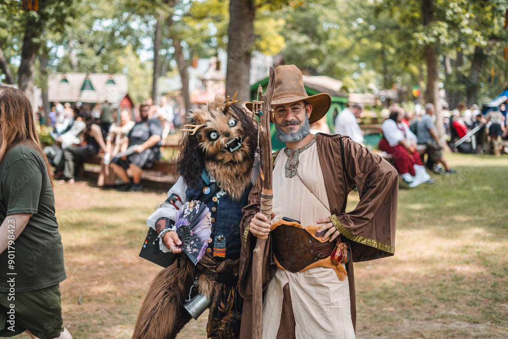 wizard standing with a montser wizard standing with a montser