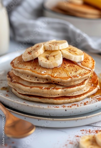 Banana Topped Pancakes on a Plate
