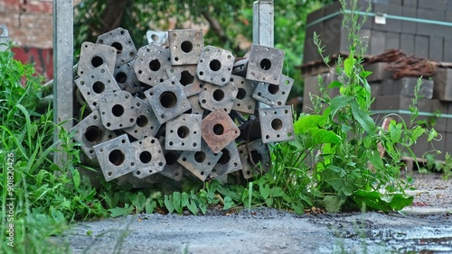 Stack of Construction Site Cuplock Scaffolding Vertical Legs Uprights Metal Element photo