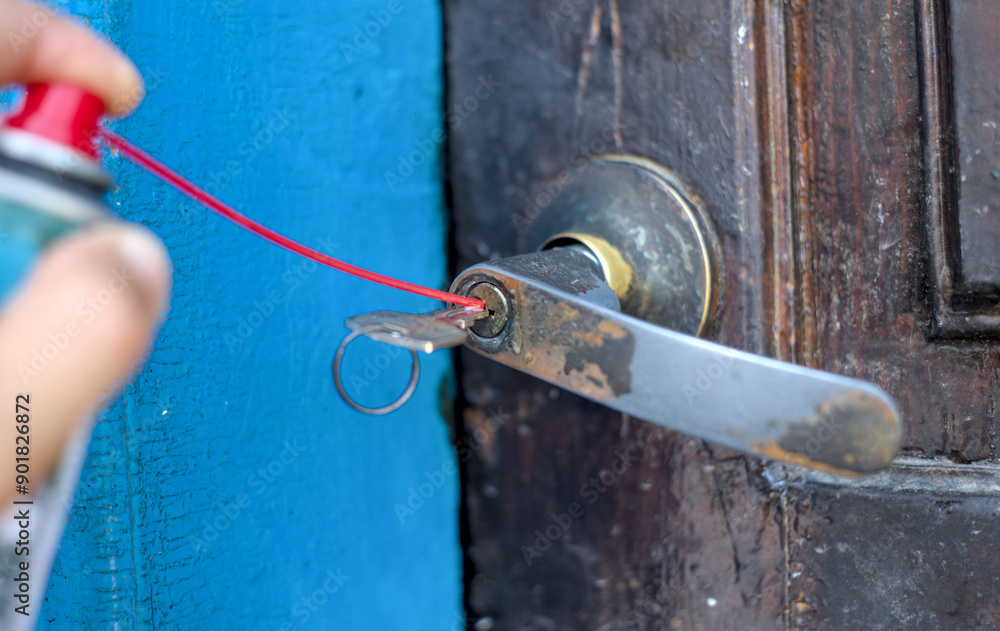 Lubricating of lock with key