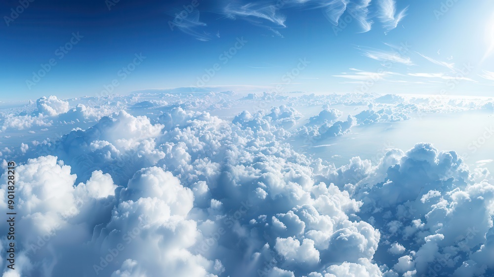 Fototapeta premium Vast sky filled with cottonlike clouds and a gradient of blue hues, sky panorama, spaciousness