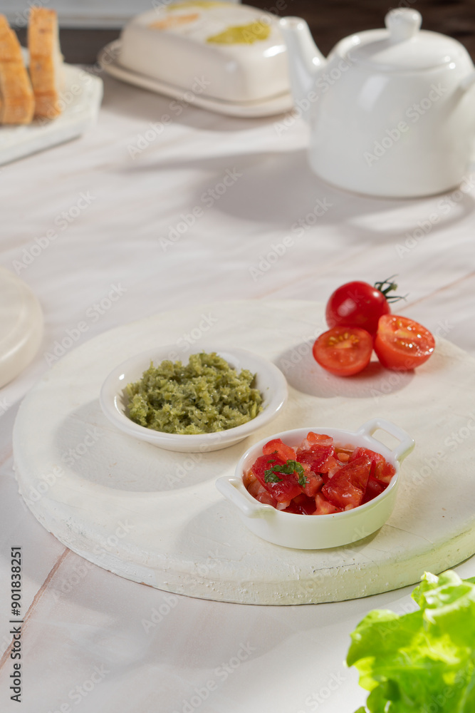 Vegetable sauces of different colors in bowls on a light background Vegetable sauces of different colors in bowls on a light background