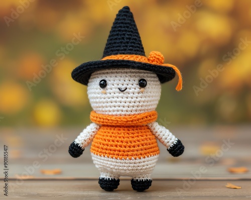 Crochet amigurumi ghost in a witch hat, Halloween blend, spooky and magical photo