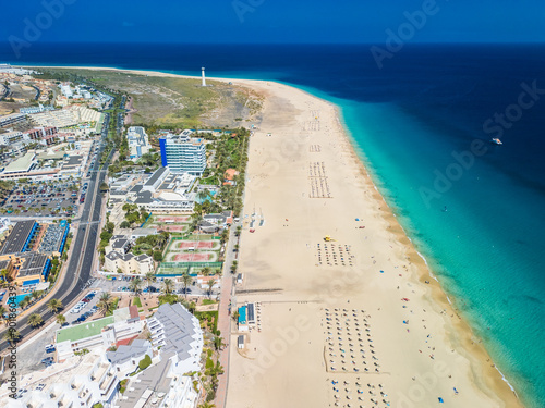 White sandy beach and blue water in Morro Jable, south of Fuerteventura, Canary islands photo