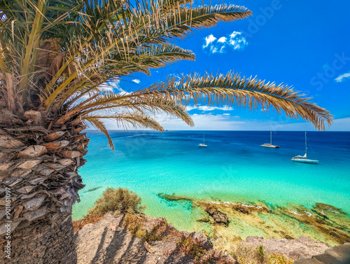 White sandy beach and blue water in Morro Jable, south of Fuerteventura, Canary islands