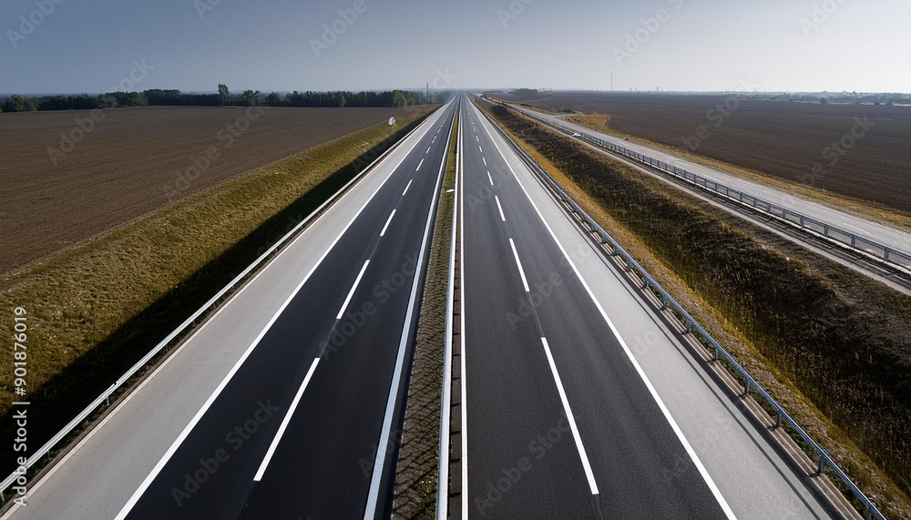 Fototapeta premium Empty highway black asphalt road and white dividing lines Top view