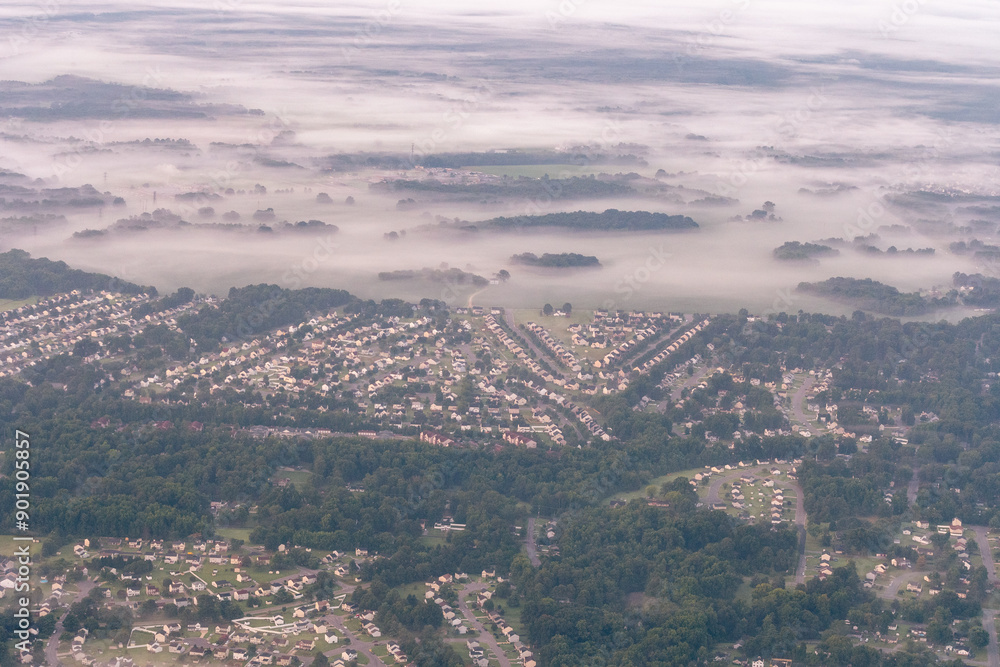 Richmond, Virginia - Aerial view of suburban developments and residential homes in Richmond, Virginia on a foggy morning Richmond, Virginia - Aerial view of suburban developments and residential homes in Richmond, Virginia on a foggy morning