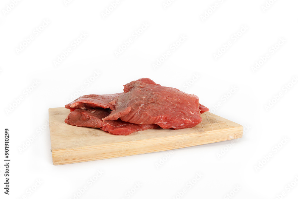 steak raw on wooden cutting board isolated on white steak raw on wooden cutting board isolated on white