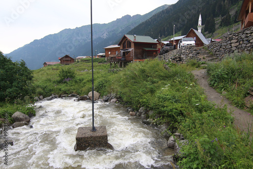 Elevit village, one of the plateau villages in the Kaçkar Mountains in the Black Sea region of Turkey, is fascinating with its magnificent nature and flowing streams. photo