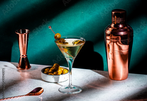 Bild auf Leinwand Martini, alcoholic cocktail drink with vodka, vermouth, olives on dark backgroun