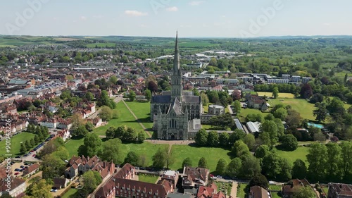 Rotating around Aerial Drone shot of Salisbury Cathedral Daytime Wiltshire photo