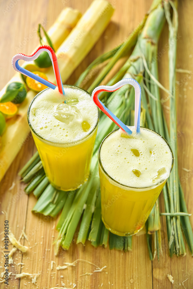 Nuoc mia is Vietnamese sugarcane juice with the real fruit background ...