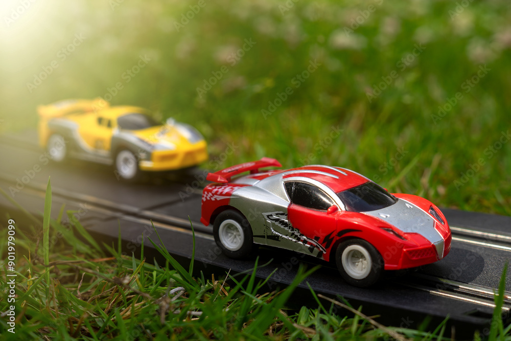 The car is radio-controlled.A toy car race.To catch up with the opponent.Competitions The car is radio-controlled.A toy car race.To catch up with the opponent.Competitions