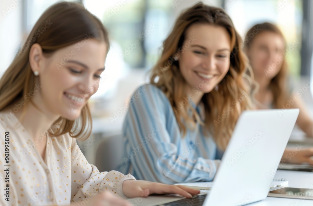 Smiling Women Working On Laptops Smiling Women Working On Laptops