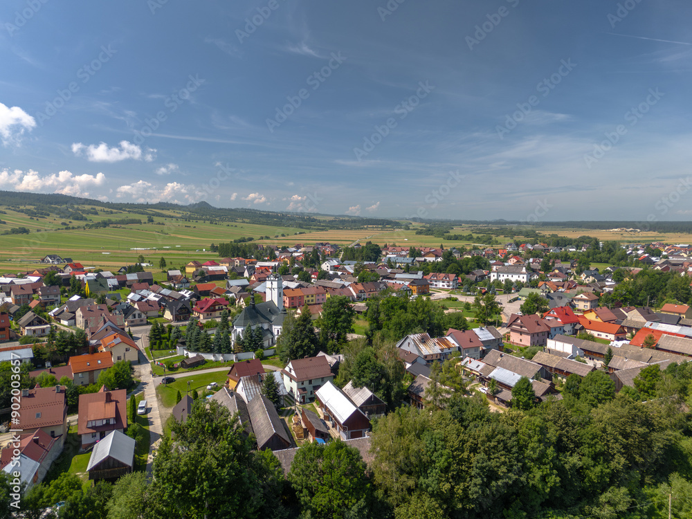 Summer skyline cityscape of Frydman village at Czorsztyn lake (Jezioro Czorsztyńskie) in Lesser Poland (Małopolska). Aaerial view