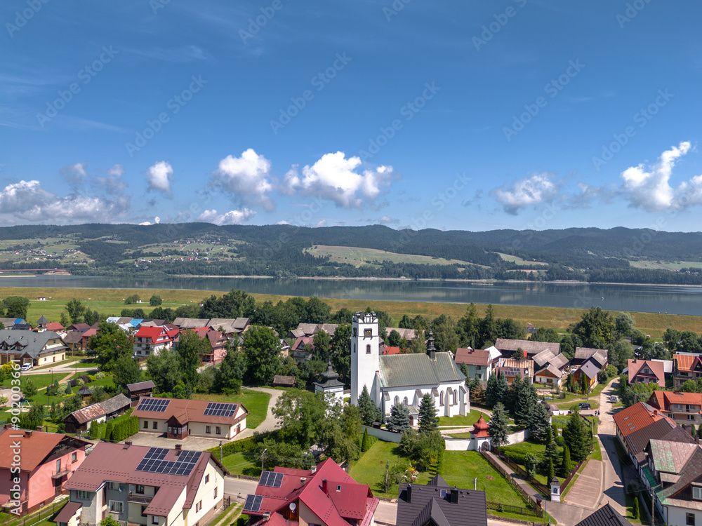 Summer skyline cityscape of Frydman village at Czorsztyn lake (Jezioro Czorsztyńskie) in Lesser Poland (Małopolska). Aaerial view