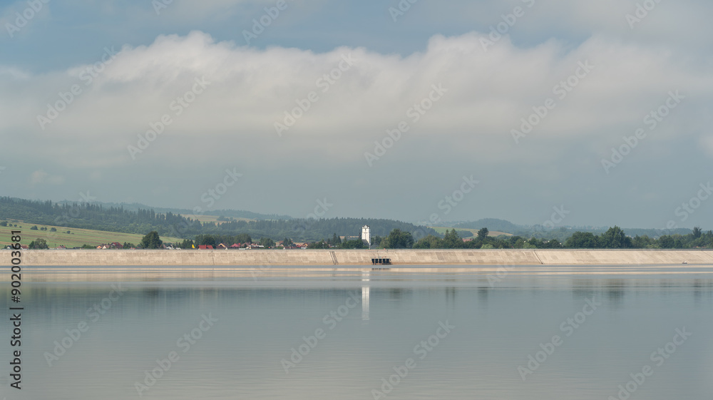 Summer skyline cityscape of Frydman village at Czorsztyn lake (Jezioro Czorsztyńskie) in Lesser Poland (Małopolska), Poland. Wide panoramic view