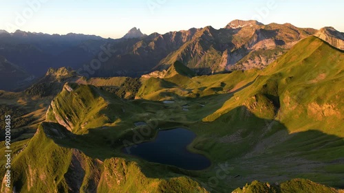 Aerial view of Lake Montagnon in the Pyrénées-Atlantiques, France. Heart-shaped mountain lake at sunrise. photo