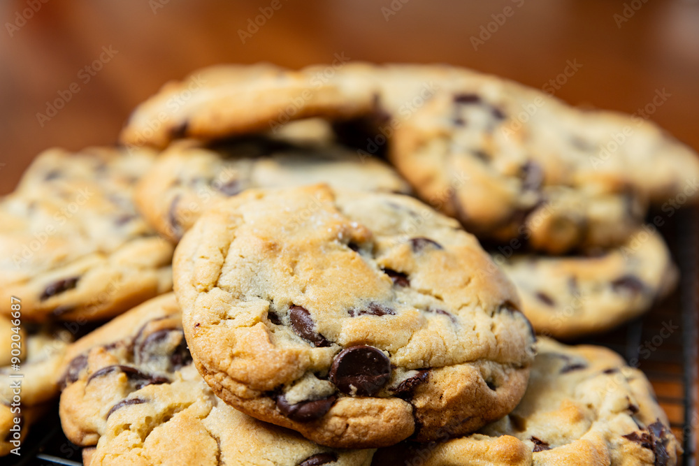 Close up of fresh batch of homemade chocolate chip cookies, selective focus. Close up of fresh batch of homemade chocolate chip cookies, selective focus.