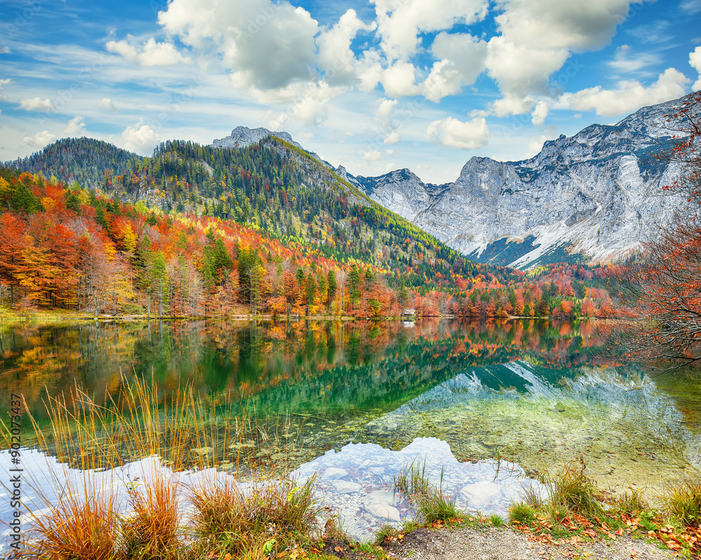 Captivating autumn scene of Hinterer Langbathsee lake.
