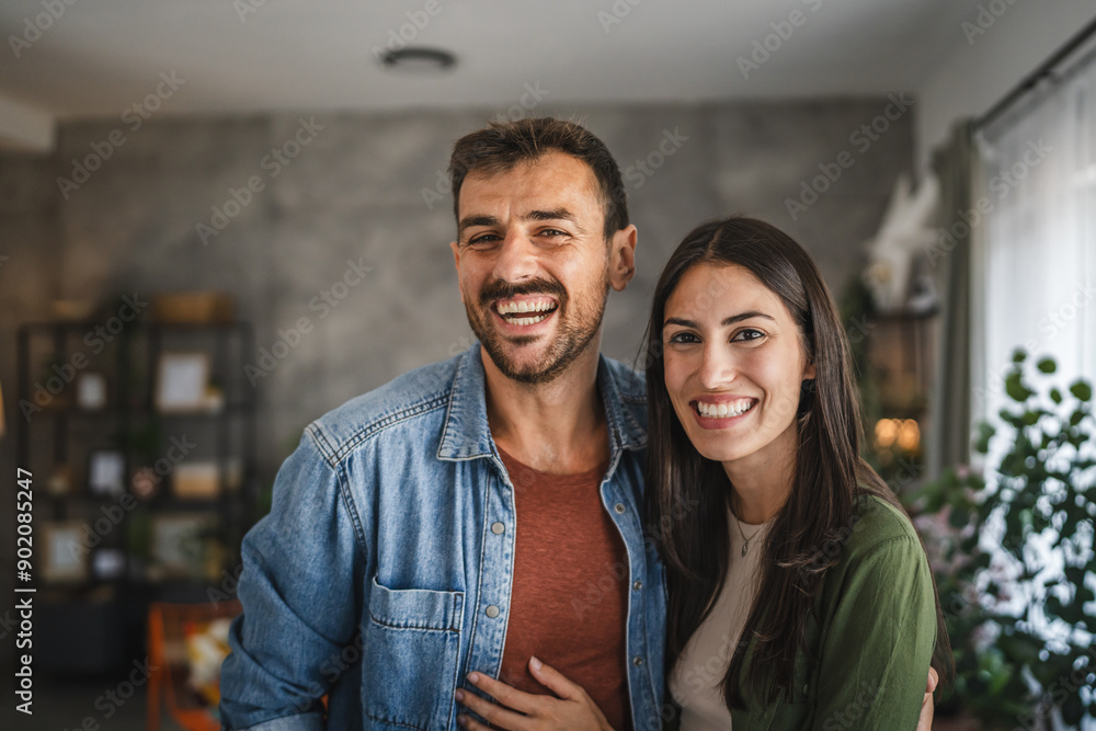 Portrait of beautiful couple stand, smile and hug at home Portrait of beautiful couple stand, smile and hug at home