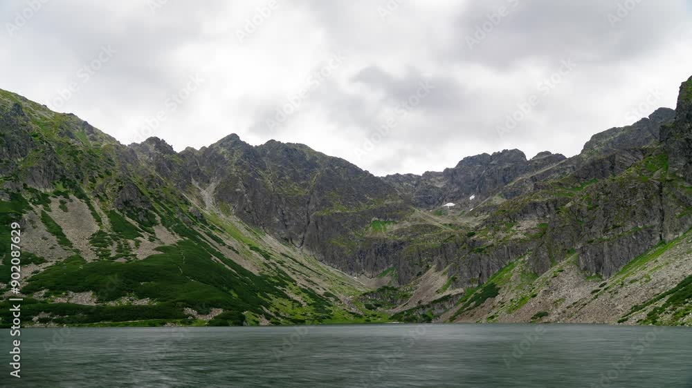 Timelapse of Tatra Mountains and Lake in Summer Daytime Timelapse of Tatra Mountains and Lake in Summer Daytime