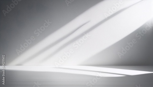 Wallpaper Mural Sunlight streams through a window casting long shadows on a white wall and floor Torontodigital.ca