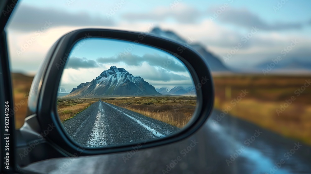 Landscape in the sideview mirror of a car , on road countryside. Landscape in the sideview mirror of a car , on road countryside.