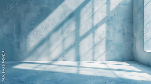 Minimal abstract light blue background for product presentation. Shadow and light from windows on plaster wall.