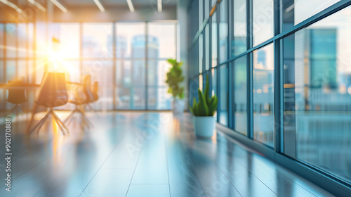 Beautiful blurred background of a light modern office interior with panoramic windows and beautiful lighting.