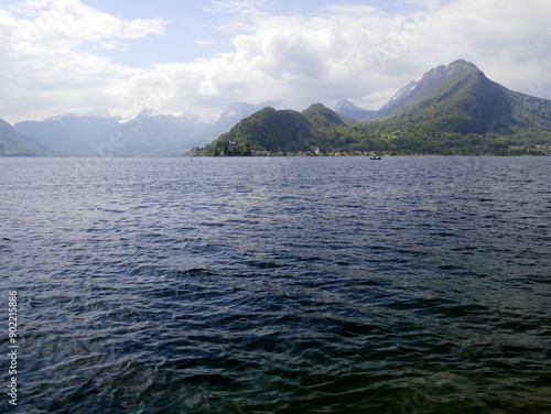 Duingt village and mountains in Annecy lake, in Haute savoie. Lake and mountains landscape in France in the Alps. photo