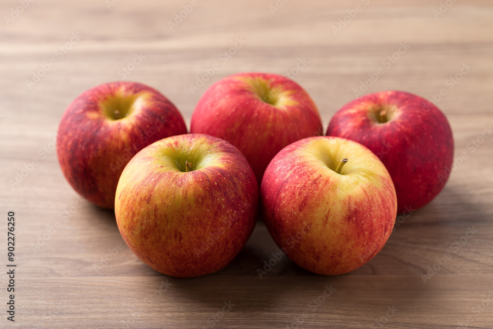 Red apple fruit (Envy apple) on wooden background Red apple fruit (Envy apple) on wooden background