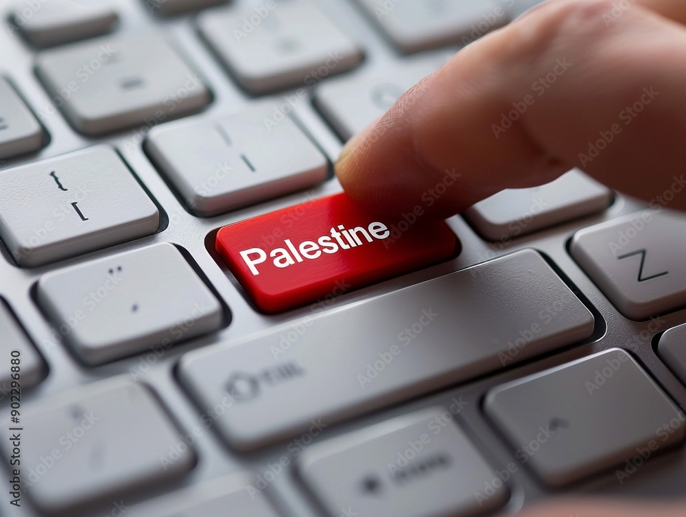 Close-Up of Finger Pressing Red Palestine Button on Computer Keyboard Close-Up of Finger Pressing Red Palestine Button on Computer Keyboard