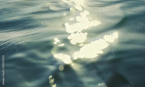 Caustic water with light and ripples on the water surface in slow motion 300fps 4K video photo