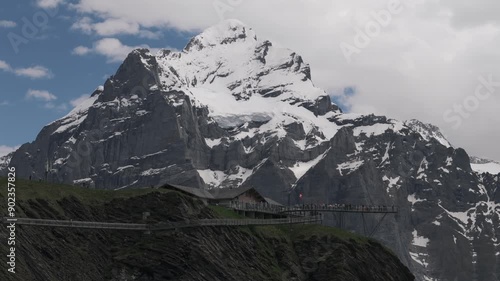 Tissot Cliffwalk at First Station with Swiss Alps in Background photo