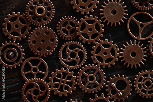 Wallpaper Mural Close-Up of Vintage Brass Gears on Dark Background - Steampunk Mechanical Parts and Industrial Design Torontodigital.ca