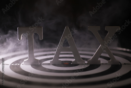 Wallpaper Mural Concept of Tax Planning: Metal TAX Letters on Target with Smoky Background Torontodigital.ca