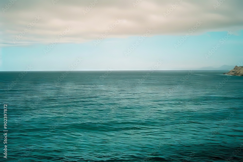 A view of the ocean from the top of a hill A view of the ocean from the top of a hill