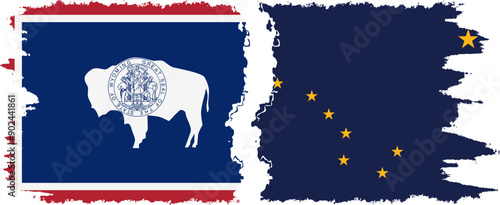 Alaska and Wyoming states grunge brush flags connection, vector