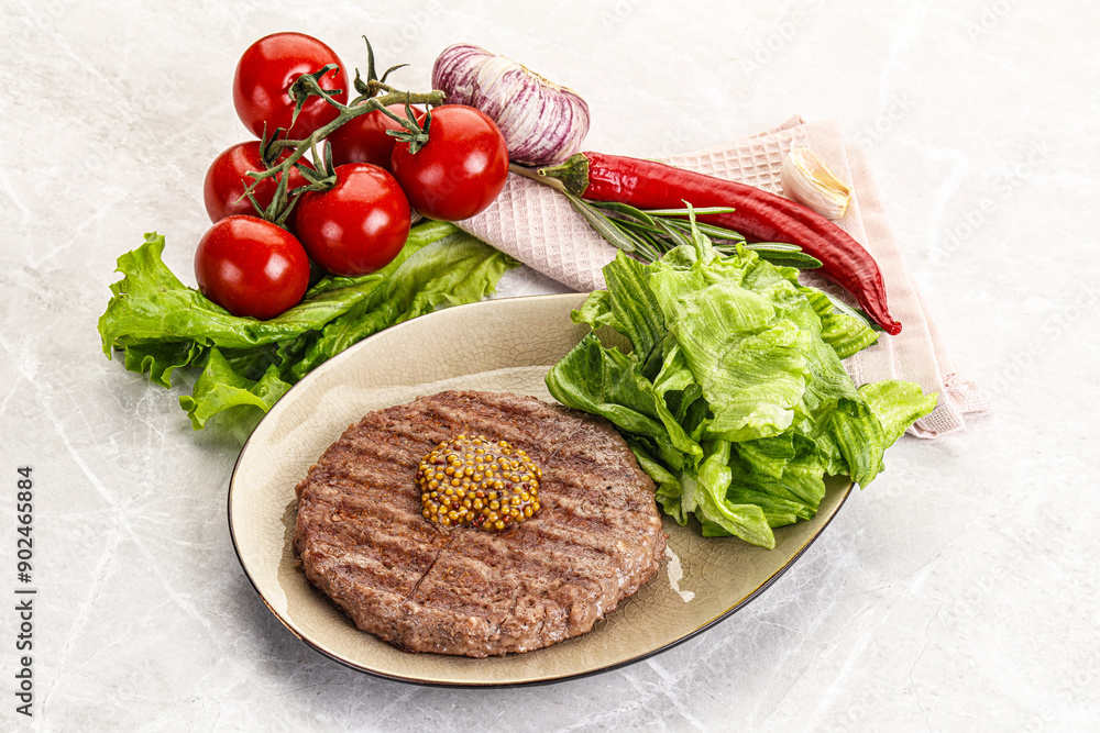 Frilled beef burger cutlet with iceberg Frilled beef burger cutlet with iceberg